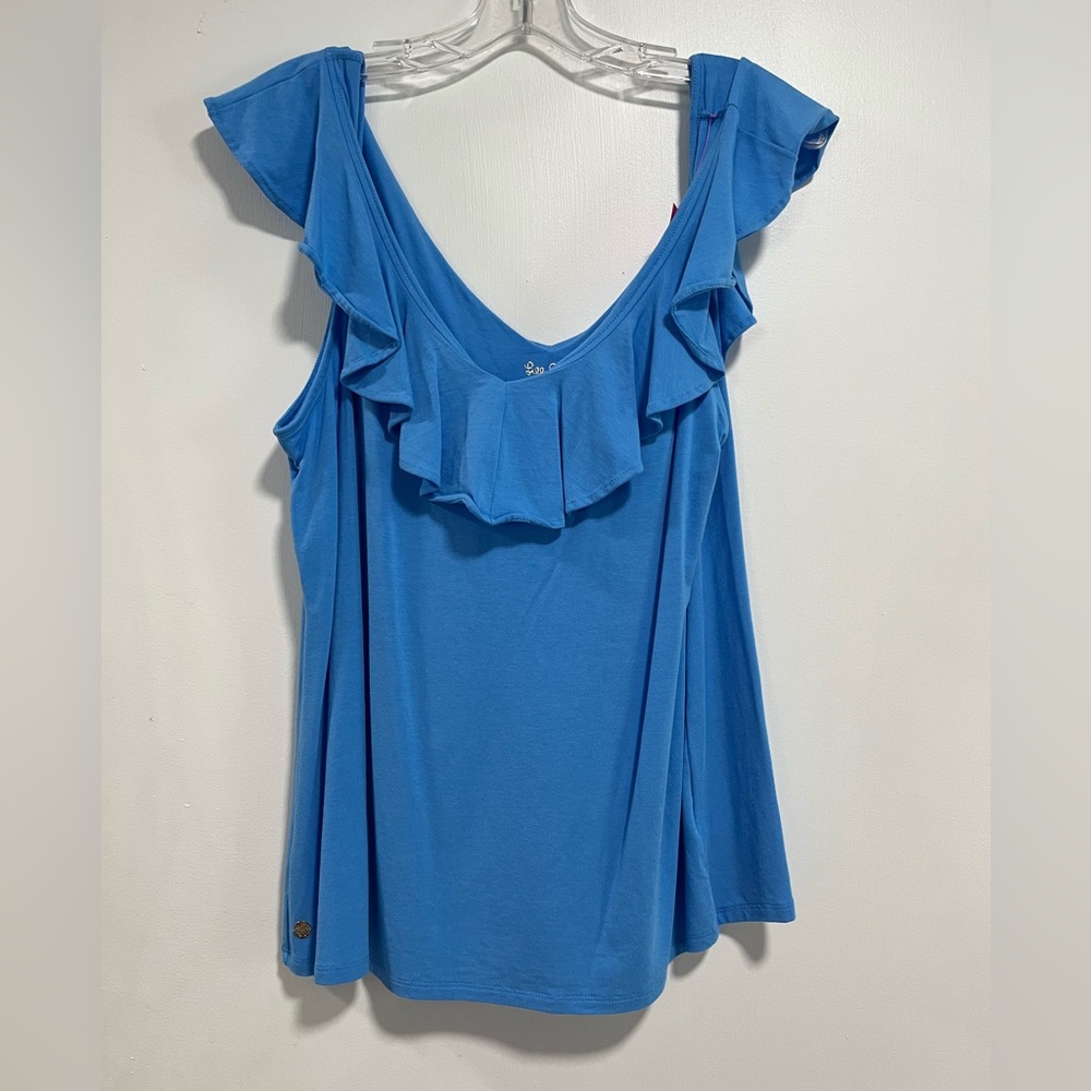 Alessa top in blue thistle, loose with ruffle sleeves all around